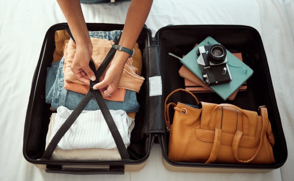 Woman packing a suitcase