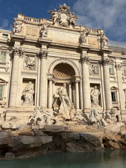 Trevi Fountain in Rome with intricate Baroque sculptures and flowing water, one of the city’s most iconic landmarks